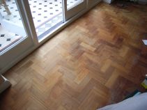 Wooden floor during restoration by DJ Bulpitt